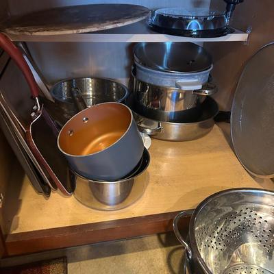 Pizza Stone, Steamer, Colander, and Saucepan