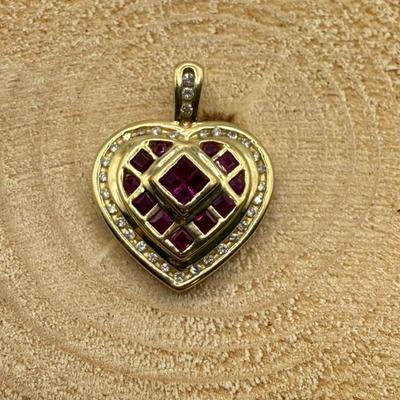 14k Yellow Gold Heart Pendant W/Rubies & Diamonds, 4 Grams
Lot #: 6