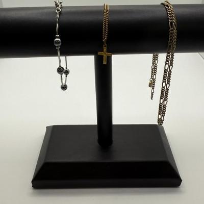 Lot (3) Costume Jewelry- Children's Cross Bracelet, Silver-tone & Faux Pearl Bracelet & Gold-Tone Watch Fob
Lot #: 130