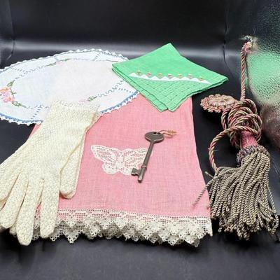 Lot Misc Linens, Pair Lace Gloves, Old Key, Tasseled Picture Hanger
Lot #: 118