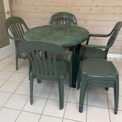 Green Plastic Patio Dining Set With Four Chairs And Three Side Tables