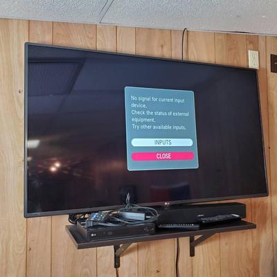 LG 54” TV, Bose sound bar model 418775 & LG DVD player 