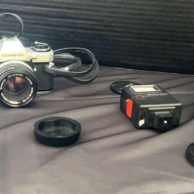 Olympus OM-10 35mm SLR with Zuiko 50mm f/1.8, 80–200mm f/4 MC Macro Lens & Flash