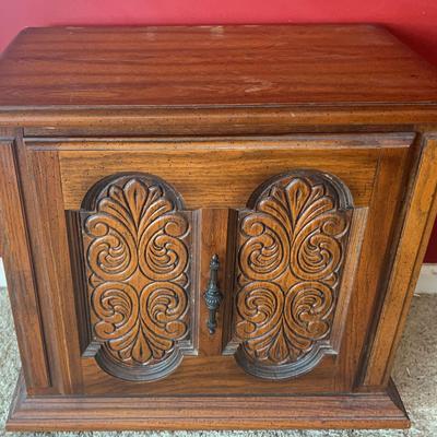 Vintage Wooden Nightstand with Ornate Carved Doors