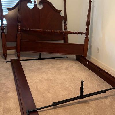 Four-Poster Bed with Elegant Carved Details