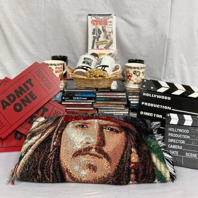 One box of Cds and Movie Buff Collectibles
