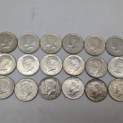 Eighteen 1964 Kennedy Half Dollars