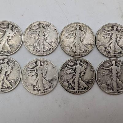 Eight 1940's Walking Liberty Half Dollars 