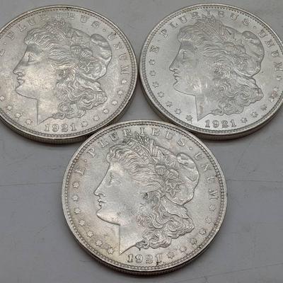 Three 1921 Morgan Silver Dollars