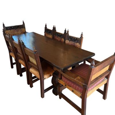 Lot #53 - Antique Spanish Colonial Style Walnut Trestle Dining Table with Eight Leather Chairs