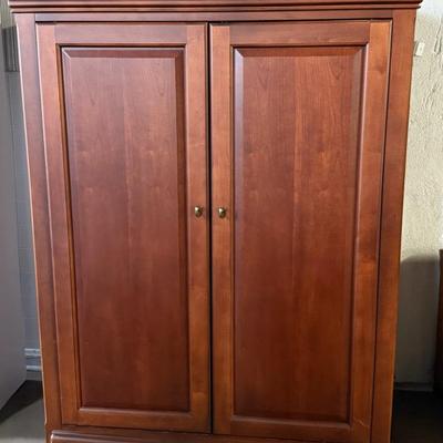 Thomasville Furniture Armoire Or Cabinet With Retractable Doors