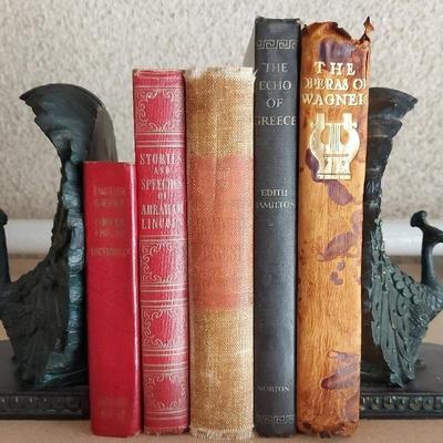 VINTAGE BOOKS WITH PEACOCK BOOKENDS