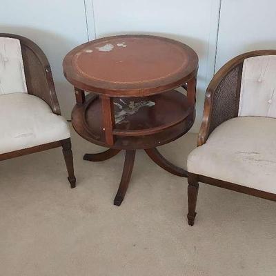 TWO NICELY CRAFTED CLUB CHAIRS AND AN ANTIQUE TABLE