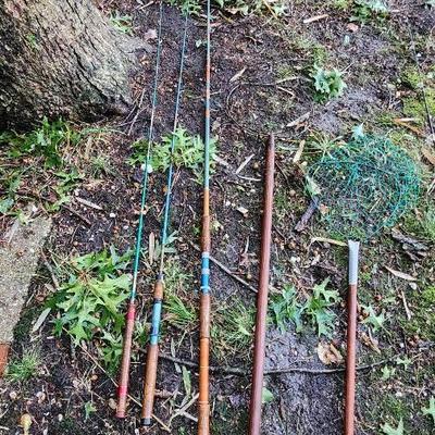 Vintage Fishing Poles And Nets