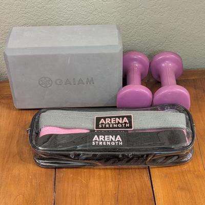 Lot #150 - Gaiam Yoga Block, Arena Strength Resistance Bands, and Pink Dumbbells Set