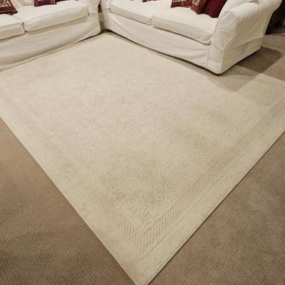 Lot #173 - Cream Patterned Area Rug