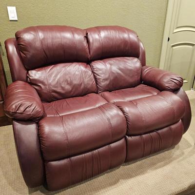Lot #92 - Burgundy Leather Reclining Loveseat