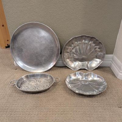 Lot #53 - Set of Decorative Metal Serving Platters: Nambe 221 Oval Platter, Vari Disenos Decorative Tray, & 2 Clam Trays