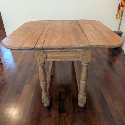Lot #37 - Antique Rustic Wooden Drop-Leaf Table with Turned Legs