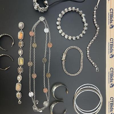 Assorted Silver Colored Bracelets, Necklace And Hair Tie