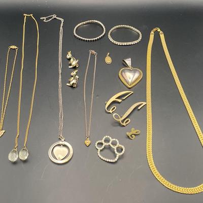 Lot Of Costume Jewelry Silver tone, Gold  Tone, Bracelets, Necklaces, Pendants, And Pins
