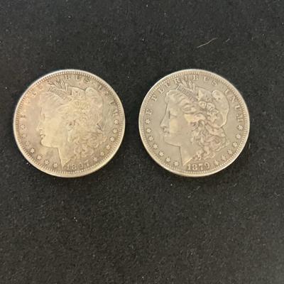 1897 S Morgan Silver Dollar And 1879 P Morgan Silver Dollar