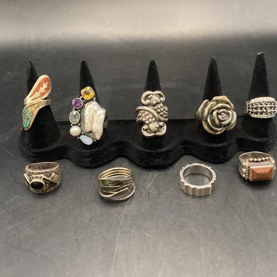 Collection of 9 STERLING SILVER rings, flower, gemstone, CZ  81 grams total 