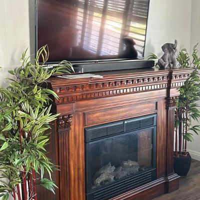 One of two electric fireplaces. Perfect for hanging your Christmas stockings. 