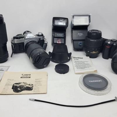 Canon AR-1 And Nikon Cameras With Accessories 