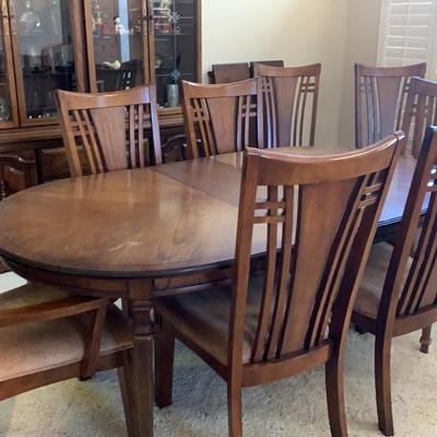 Wooden Oval Table With Three Leafs And Eight Chairs