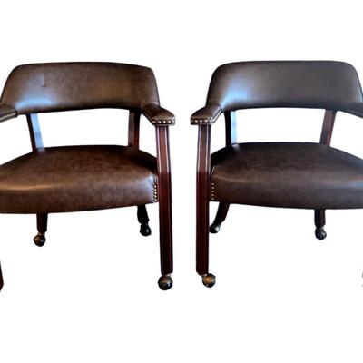Set of leather-like, rolling chairs 