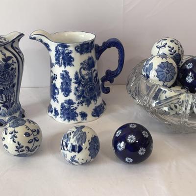 Porcelain Balls, Crystal Bowl And Two Pitchers 