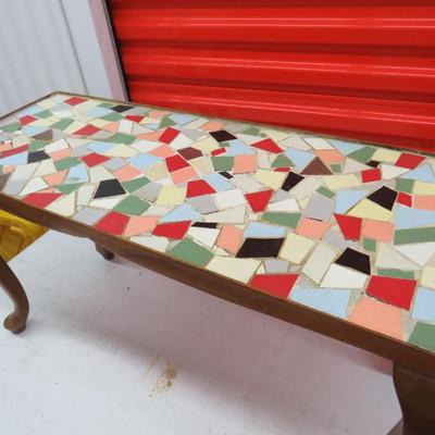 coffee table with broken tile top