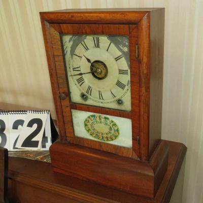 pendulum style mantle clock