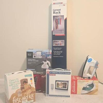 Small Household Items Includes Steam Cleaner, Sunbeam, Garment Rack, Digital Photo Frame +