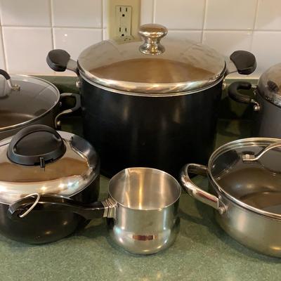 Assortment Of Various Cookware Brands Pots And Pans