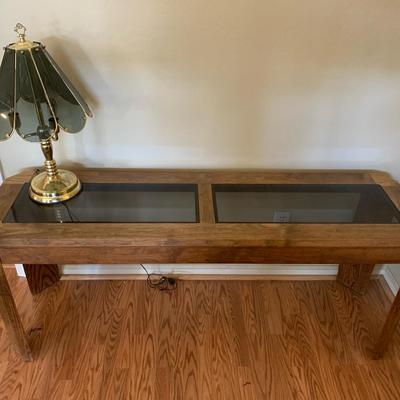 Wooden Table With Glass Middle And Lamp