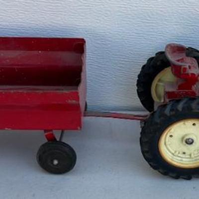 Vintage International Die Cast Tractor With A Tin Trailer
