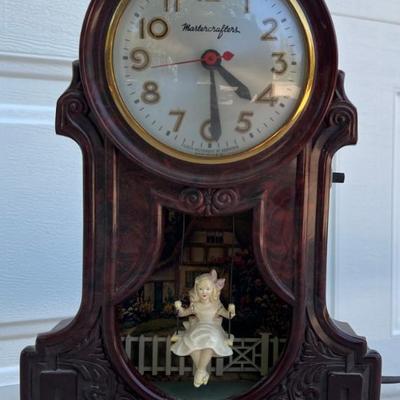 1950's Mastercrafters Bakelite Swinging Lighted Motion Clock