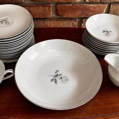 Sale Photo Thumbnail #16: Dinnerware China set-Floral center design. 14 desert plates; 8 saucers; 1 creamer bowl; 1 coffee cup, 1 serving bowl.