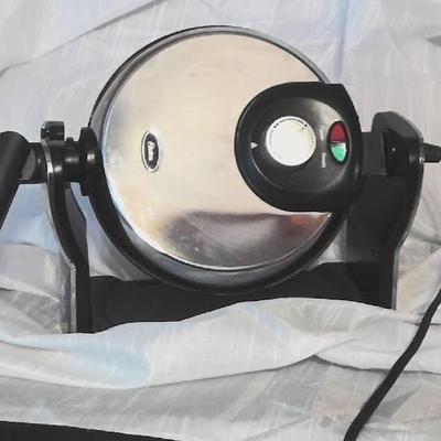 Sale Photo Thumbnail #52: Oster Rotary Waffle Maker.
