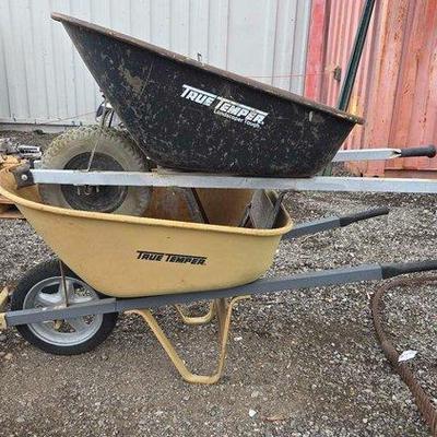 80015 • (2) true temper wheel barrows