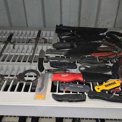 Sale Photo Thumbnail #189: 8096 • (36) knives, hand cuffs & more