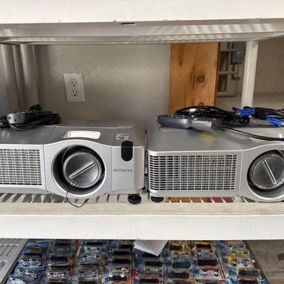 20074 • 2 hitachi multi lcd projectors with cords and remotes