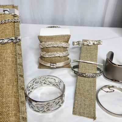 Glimmering Silver Tone Bracelets