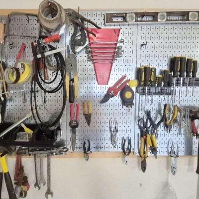 Hanging Tool Holder with Assortment of Screw Driver, Wrench, Hammers, and Pliers