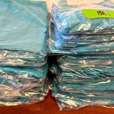 Lot 128:  Bundle Of Teal Colored Scrub Tops And Pants- LG And XL
