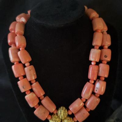 Lot 542: Coral Colored Necklaces