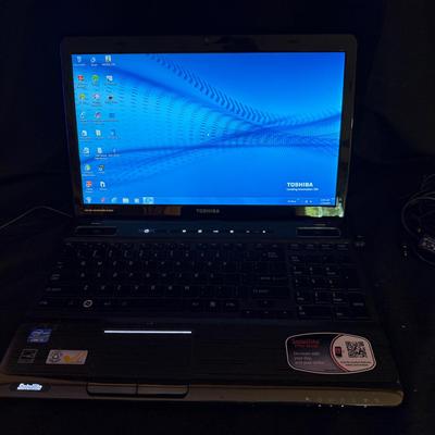 Lot 429: Toshiba Satellite P755-S5320 Laptop – Intel Core i3, Windows 7, Harman/Kardon Audio