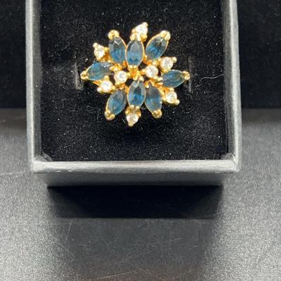 Sapphire And Sparkly Ring On Yellow Gold Band